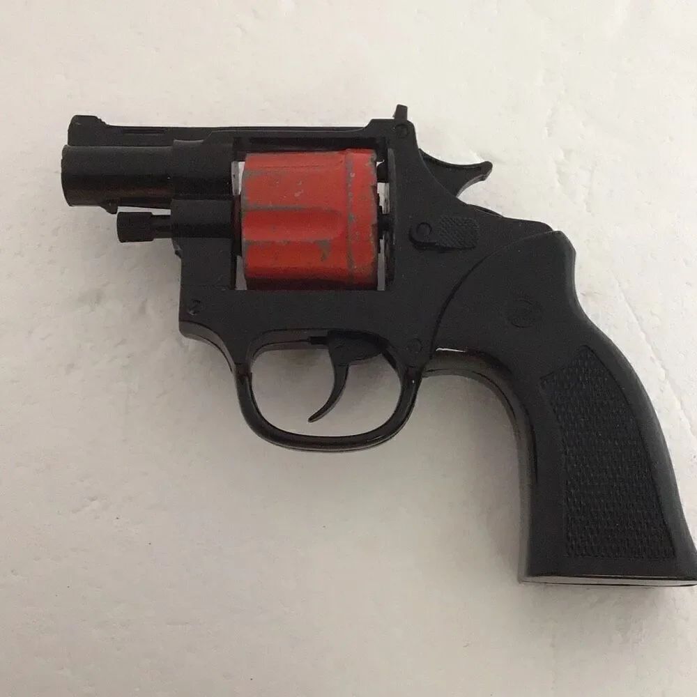 Vintage toy, ring clip cap gun